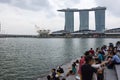 Tourists at the Singapore Merlion Park overlooking Marina Bay Sa