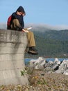 Tourists Sit along Lake Baikal