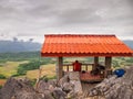 Tourists sitting in pavilion on rocky mountain Pha Ngeun the shooting attractions with the beautiful landscape Royalty Free Stock Photo