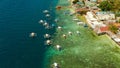 Tourists snorkeling in coral reef, Moalboal, Philippines