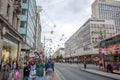 Tourists spending their time in Oxford street, a very famous shopping street in London