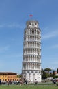 Tourists on Square of Miracles visiting Leaning Tower in Pisa, Italy Royalty Free Stock Photo