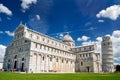 Tourists on Square of Miracles visiting Leaning Tower in Pisa, Italy. Royalty Free Stock Photo