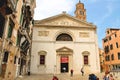 Tourists on the square near Church Santa Maria Gloriosa