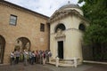 Tourists stand in front of the Dante's Tomb, a neoclassical structure built by Camillo Morigia in 1780 in Ravenna, Italy.