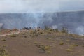 Tourists watch the lava flow inside Hawai'i Volcanoes National Royalty Free Stock Photo