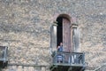 Tourists standing on the balcony of one of the buildings at Fasil Ghebbi, Gondar, Ethiopia