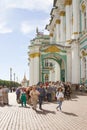 Tourists standing in queue to the State Hermitage museum in Saint-Petersburg, Russia, vertical Royalty Free Stock Photo