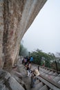 Tourists on steep mountain trail in Huashan mountain Royalty Free Stock Photo