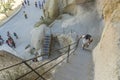 Tourists on the steps in goreme museum. Royalty Free Stock Photo