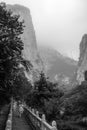 Tourists on steps on mountain trail in Huashan mountain Royalty Free Stock Photo