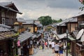 Tourists in the stone-paved roads of Ninenzaka and Sannenzaka in Kyoto. Royalty Free Stock Photo