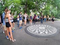 Tourists at Strawberry Fields in Central Park in New York Royalty Free Stock Photo