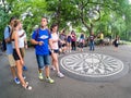 Tourists at Strawberry Fields in Central Park in New York Royalty Free Stock Photo