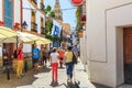 Tourists on the streets of medieval Cordoba, Spain Royalty Free Stock Photo