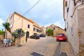 Tourists on the streets of the old village Capdepera. Island Majorca, Spain. Royalty Free Stock Photo