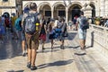 tourists stroll through the ancient city of Dubrovnik in Croatia. travel