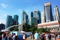 Tourists stroll the Merlion park