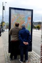tourists studing city map in copenagen denmark