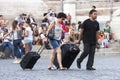 Tourists and suitcases