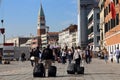 Tourists with suitcases in Venice, Italy