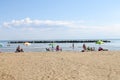 Tourists sunbathe on beach in Bellaria Igea Marina, Rimini