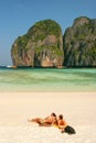 Tourists sunbathing at Maya Bay beach on Phi Phi Leh Island, Krabi Province, Thailand