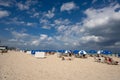 Tourists sunbathing Miami Beach FL USA