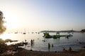 Tourists sunbathing at sunset Royalty Free Stock Photo