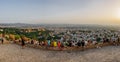 Tourists and sunset over Granada and Alhambra