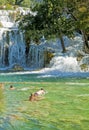 Tourists swim at Krka waterfalls, Croatia