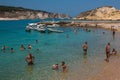 Tourists swimming on beautiful and crystalline sea of Isole Tremiti