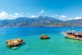 Tourists are swimming by enjoying the turquoise waters in Suluada of Adrasan. Antalya-Turkey Royalty Free Stock Photo