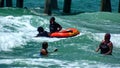 Tourists swimming with an inflatable raft