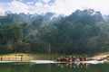 Tourists take a boat to see the scenery of the forest, wildlife and Bang Lang reservoir.