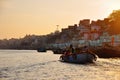 Tourists take a boat tour on the Ganges River in Varanasi, India. Royalty Free Stock Photo