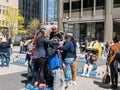 Tourists take group selfie at NFL display on Michigan Avenue, Ch