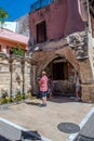 Tourists take photos in front of Rimondi Fountain in Platanou Square, which was the center of the Venetian city of Rethymno. Crete