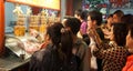 Tourists take photos, Wangfujing Snack Street at night, China