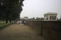 Tourists take a walk on a smog day inside red fort located in New Delhi