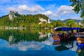 Tourists taking boat on Lake Bled in Slovenia