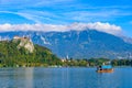 Tourists taking boat on Lake Bled in Slovenia