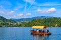 Tourists taking boat on Lake Bled in Slovenia