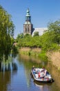 Tourists taking a cruise on the Vechte river in Nordhorn