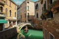 Tourists taking gondola ride in Venice, Italy Royalty Free Stock Photo