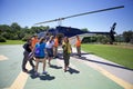 Tourists are taking helicopter flight over Iguazu, Brazil