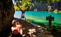 Tourists taking a photo on the wooden bridge in Plitvice Lakes National Park in Croatia Royalty Free Stock Photo