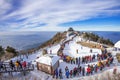 Tourists taking photos of the beautiful scenery and skiing around Deogyusan,South Korea. Royalty Free Stock Photo