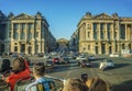 Tourists taking photos from bus tour in Paris. France