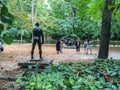 Tourists taking photos on the grounds of the Rodin Museum, Paris